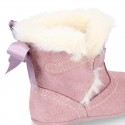 Baby girl bootie with BOW, hook and loop strap closure in suede leather.