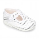 Cotton canvas T-Strap shoes with blue polka dots design.