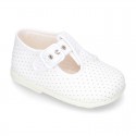 Cotton canvas T-Strap shoes with blue polka dots design.