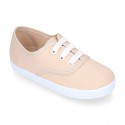 Cotton Canvas sneakers or bamba shoes with laces closure.