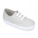 Cotton Canvas sneakers or bamba shoes with laces closure.