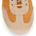 Suede leather kids Sneaker style espadrille shoes with perforated design.