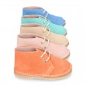 Suede leather kids safari boots with laces in SPRING colors.