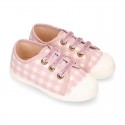 VICHY Cotton canvas kids tennis style shoes with shoelaces closure and toe cap.