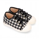 VICHY Cotton canvas kids tennis style shoes with shoelaces closure and toe cap.