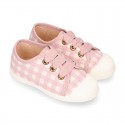 VICHY Cotton canvas kids tennis style shoes with shoelaces closure and toe cap.