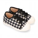 VICHY Cotton canvas kids tennis style shoes with shoelaces closure and toe cap.