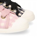 VICHY Cotton canvas kids tennis style shoes with shoelaces closure and toe cap.