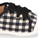 VICHY Cotton canvas kids tennis style shoes with shoelaces closure and toe cap.