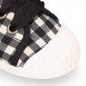 VICHY Cotton canvas kids tennis style shoes with shoelaces closure and toe cap.