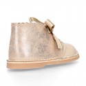 CEREMONY Girl Safari Boots with silk laces closure and waves in combined leather.