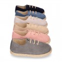 Suede leather Laces up style espadrille shoes.