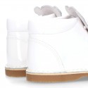 Little bear safari style boots in WHITE patent leather.