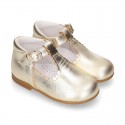 Classic Kids Laminated Nappa leather T-strap shoes with buckle fastening.