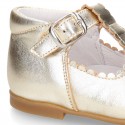 Classic Kids Laminated Nappa leather T-strap shoes with buckle fastening.