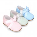 CEREMONY LINEN Laces up shoes for little kids in pastel colors.
