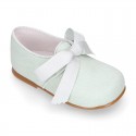 CEREMONY LINEN Laces up shoes for little kids in pastel colors.