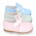 CEREMONY LINEN Laces up shoes for little kids in pastel colors.