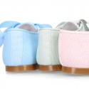 CEREMONY LINEN Laces up shoes for little kids in pastel colors.