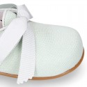 CEREMONY LINEN Laces up shoes for little kids in pastel colors.