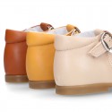 EXTRA SOFT Nappa Leather Kids T-strap shoes with buckle fastening.