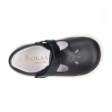 Nappa Leather Kids T-strap shoes with hook and loop strap closure with perforated design.