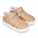 Nappa Leather Kids T-strap shoes with hook and loop strap closure with straps design.