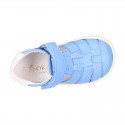 Nappa Leather Kids T-strap shoes with hook and loop strap closure with straps design.