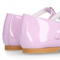 Little T-Strap Girl OKAA Mary Jane shoes in LILAC patent leather with perforated design.