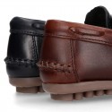 Tanned leather kids moccasins shoes with ties design in CLASSIC COLORS.