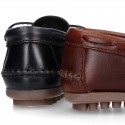 Tanned leather kids moccasins shoes with ties design in CLASSIC COLORS.