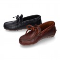 Tanned leather kids moccasins shoes with ties design in CLASSIC COLORS.