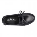 Tanned leather kids moccasins shoes with ties design in CLASSIC COLORS.