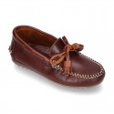 Tanned leather kids moccasins shoes with ties and TASSELS design.