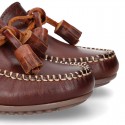 Tanned leather kids moccasins shoes with ties and TASSELS design.