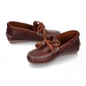 Tanned leather kids moccasins shoes with ties and TASSELS design.