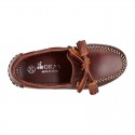 Tanned leather kids moccasins shoes with ties and TASSELS design.