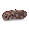 Tanned leather kids moccasins shoes with ties and TASSELS design.