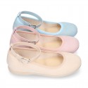 Serratex canvas Mary Janes dancer style with crossed ribbons or buckle fastening.