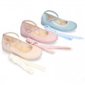 Serratex canvas Mary Janes dancer style with crossed ribbons or buckle fastening.