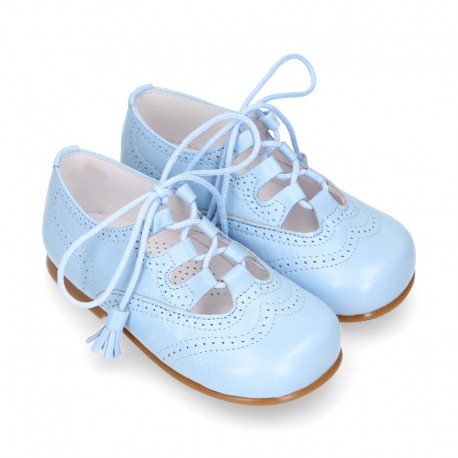 Zapato niño INGLES con cordones y borlas en piel napa AZUL.