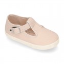 Cotton Canvas T-strap shoes with buckle fastening.