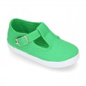 Cotton Canvas T-strap shoes with buckle fastening.