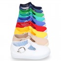 Cotton Canvas T-strap shoes with buckle fastening.