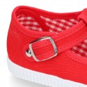 Cotton Canvas T-strap shoes with buckle fastening.