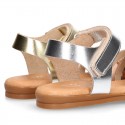 LAMINATED leather Girl sandal shoes with hook and loop strap closure with crossed straps design.