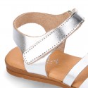 LAMINATED leather Girl sandal shoes with hook and loop strap closure with crossed straps design.