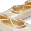 GOLD Canvas Girl Ballet flats with crossed elastic bands.