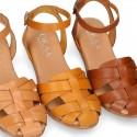 Cowhide leather Girl sandal shoes jelly type design with ankle strap closure.