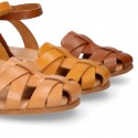 Cowhide leather Girl sandal shoes jelly type design with ankle strap closure.